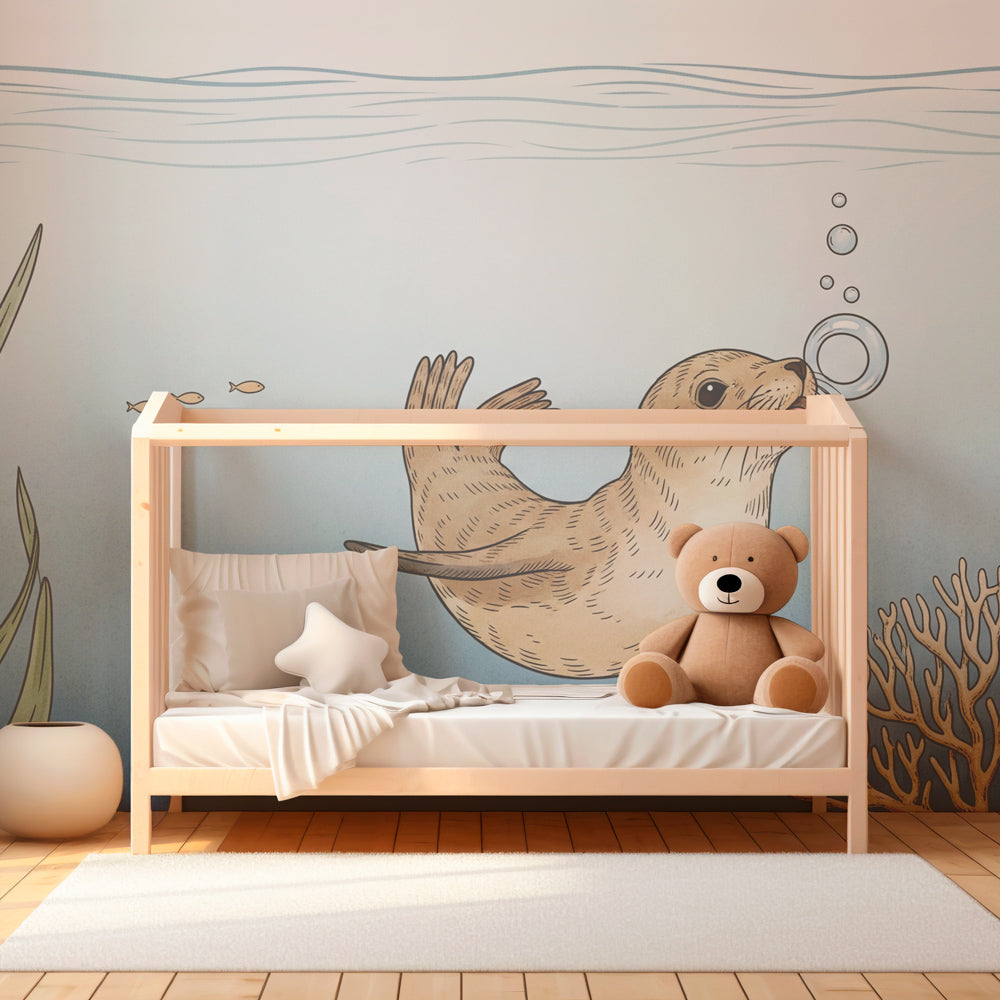 Underwater themed mural wallpaper featuring otter and coral for children's playroom
