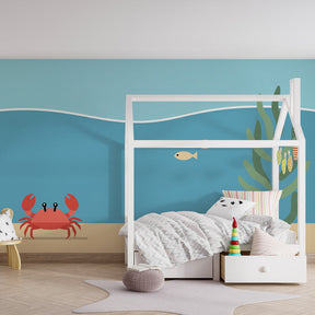 Marine adventure wallpaper with friendly crab and fish decorating peaceful nursery room