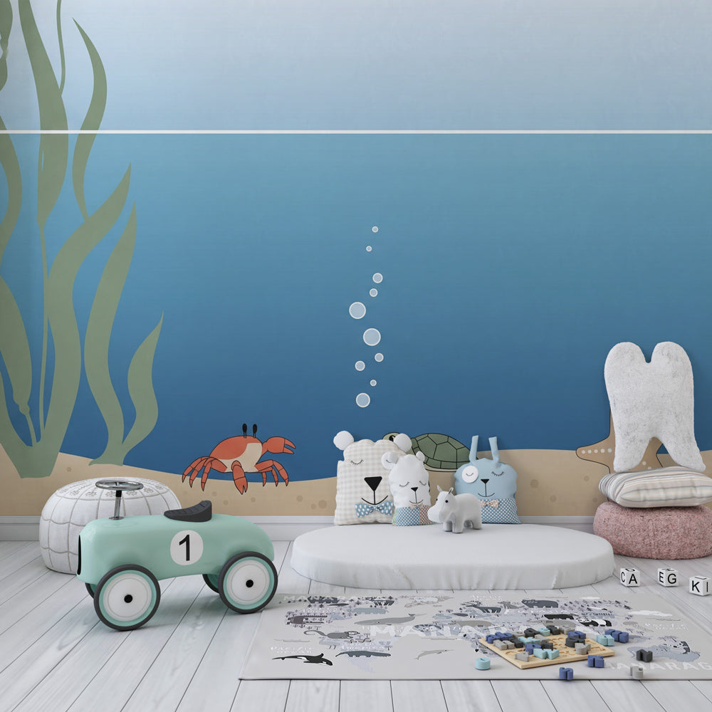 Sea turtle and crab mural wallpaper transforming nursery into underwater sanctuary