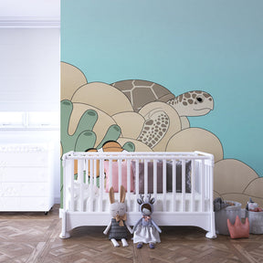 Sea turtle and clownfish mural wallpaper transforming children's playroom into ocean adventure
