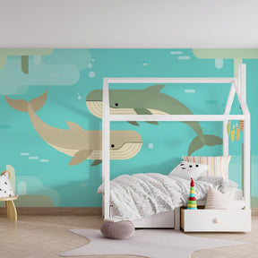 Joyful whale mural wallpaper transforming kids playroom with turquoise ocean design