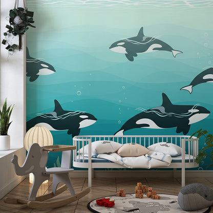 Kids-Mundo calm blue orca pod wall mural styled in a children's playroom.