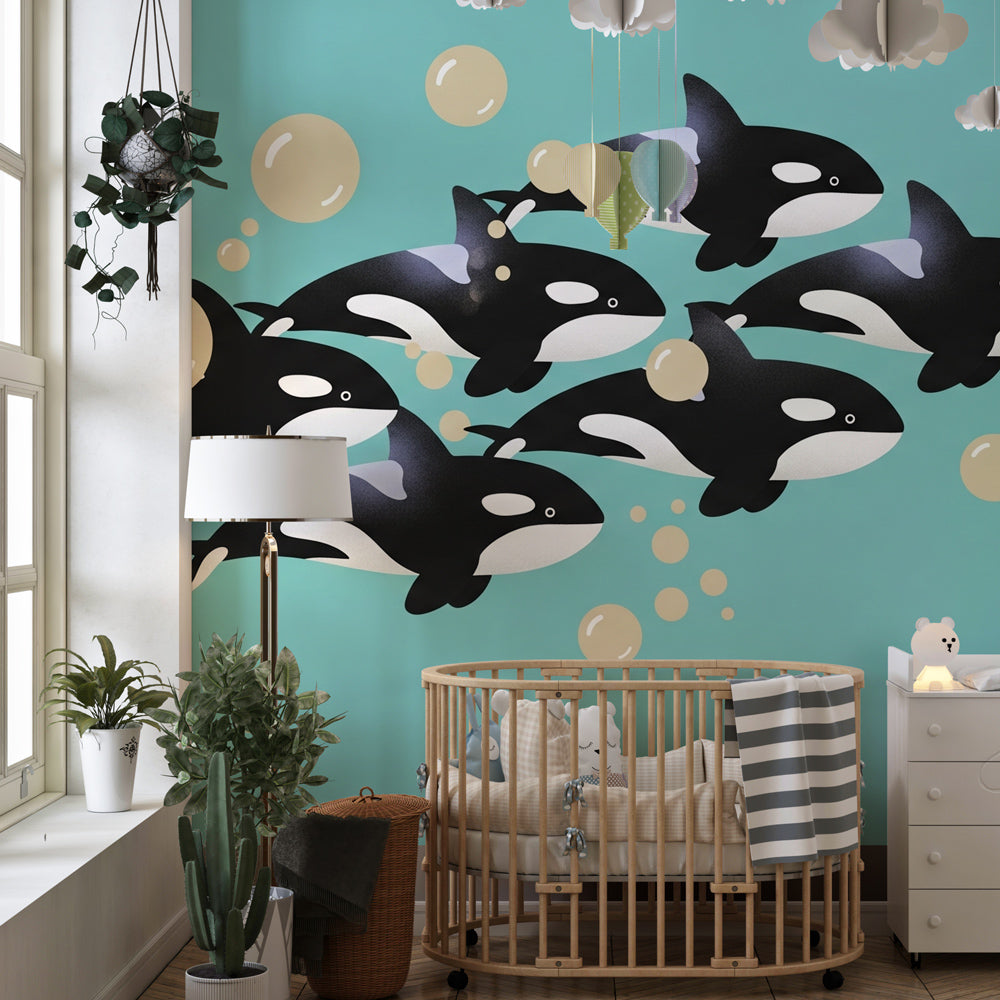 Ocean adventure mural wallpaper featuring playful orcas and bubbles for kids room by Kids-Mundo