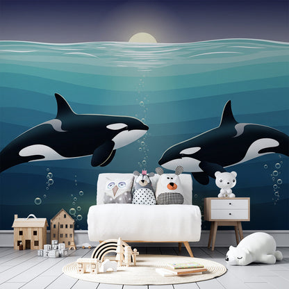 Kids-Mundo glowing orca ocean wall mural styled in a playroom with soft blue tones.