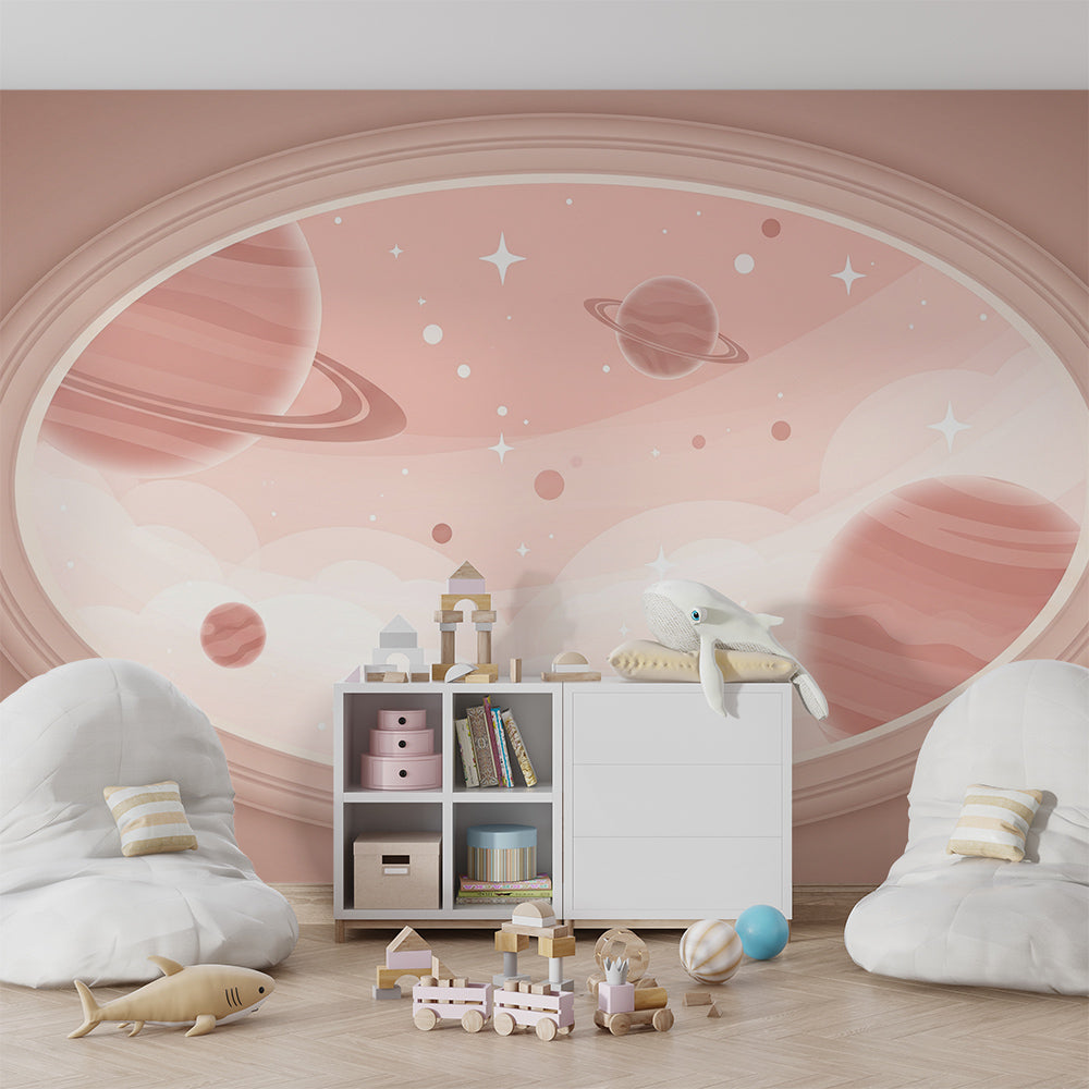 Kids-Mundo ringed planet oval mural behind a bed in a child's pink bedroom.