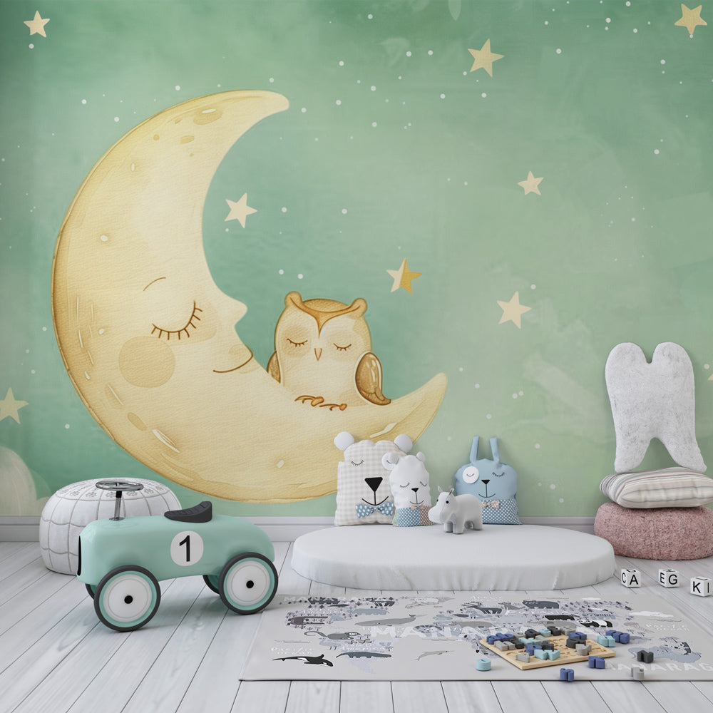 Celestial owl wallpaper in soft green tones creating dreamy atmosphere in children's bedroom by Kids-Mundo
