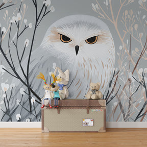 Children's owl wallpaper in cozy bedroom setting with natural wood furniture and soft lighting