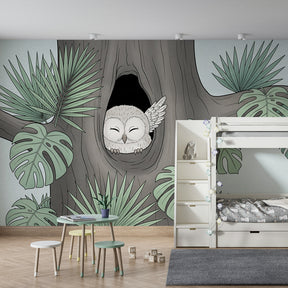 Owl mural wallpaper creating magical forest atmosphere in children's bedroom decor