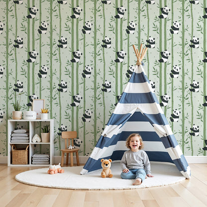 Kids-Mundo panda and bamboo wall mural in a soft sage-green nursery with a white cot and wooden rocking chair.