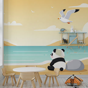 Coastal panda mural wallpaper for baby room showing peaceful beach scene with gentle waves