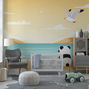 Sunny panda beach wallpaper creating serene atmosphere in toddler room with wooden furniture