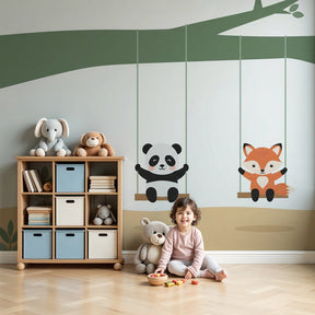 Panda and fox tree swing mural wallpaper in cozy nursery setting by Kids-Mundo