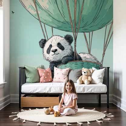 Kids-Mundo panda hot air balloon wall mural above a cot in a calm mint nursery