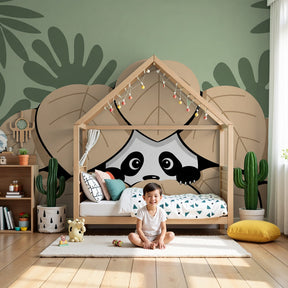 Panda jungle mural wallpaper creating safari themed nursery with soft green tropical leaves by Kids-Mundo