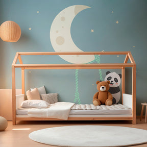 Charming panda climbing to moon wallpaper installed in modern baby bedroom with wooden furniture