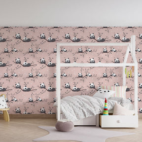 Children's panda wallpaper creating cozy bedroom atmosphere with soft pink background
