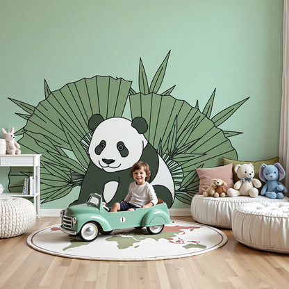 Kids-Mundo panda wall mural with tropical palm leaves in a soft green nursery room