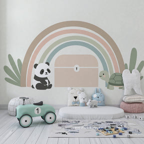 Rainbow animal wallpaper creating magical nursery decor with panda and turtle characters