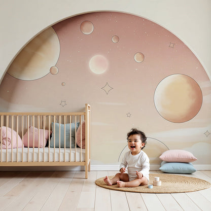 Pastel bubble planets wall mural by Kids-Mundo styled behind a cot in a soft pink nursery