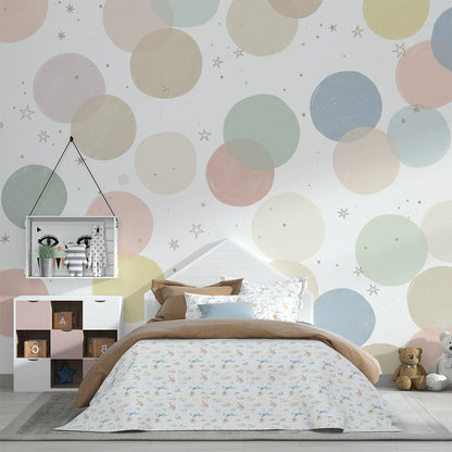 Kids-Mundo pastel circle pattern mural covering a feature wall in a gender-neutral kids' bedroom