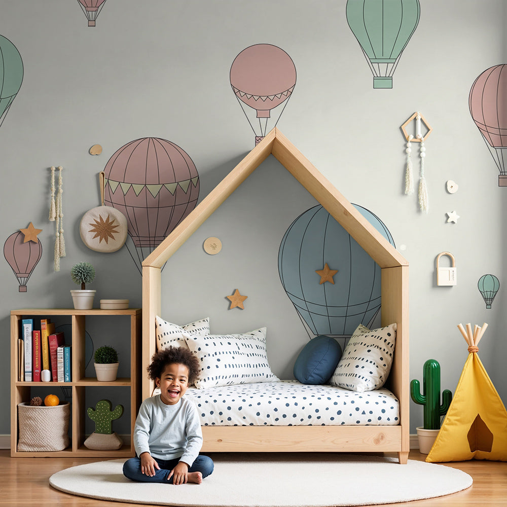 Kids-Mundo pastel hot air balloon wall mural in a calm, neutral nursery with a cot
