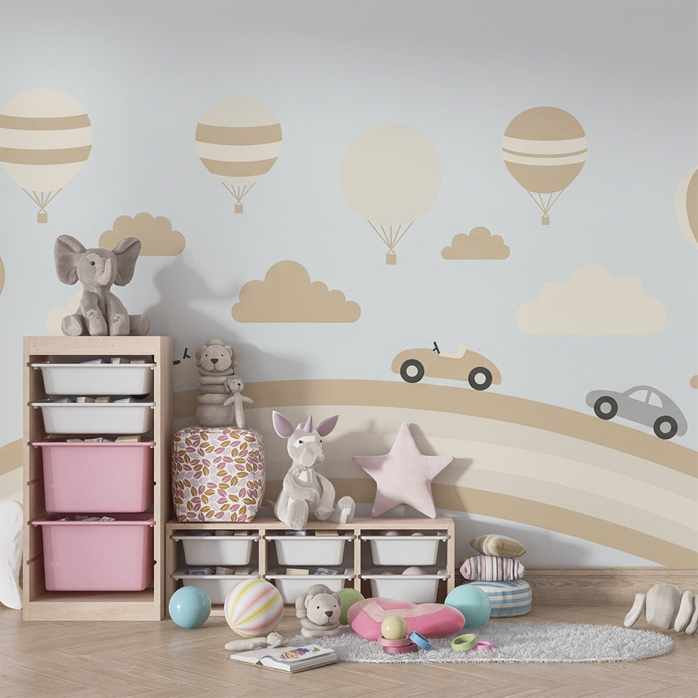 Kids-Mundo car and balloon rainbow mural brightening a playroom accent wall for children