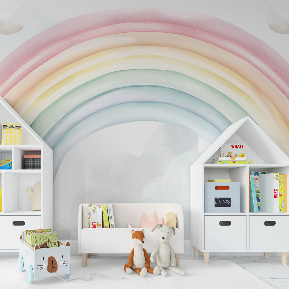 Kids-Mundo pastel watercolour rainbow and clouds wall mural featured in a colourful playroom