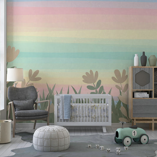 Kids-Mundo rainbow sky and wildflower wall mural behind a bed in a soft kids bedroom