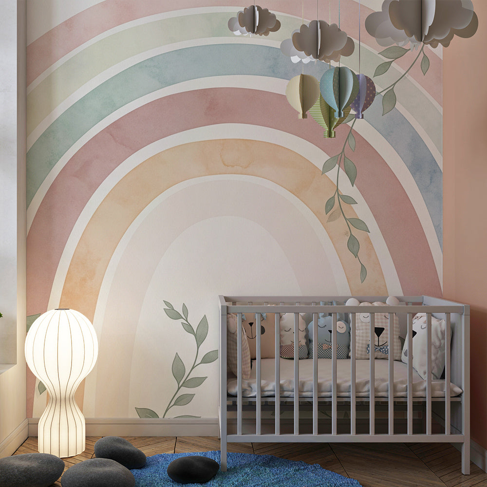 Pastel watercolour rainbow wall mural by Kids-Mundo behind a cot in a calm kids bedroom