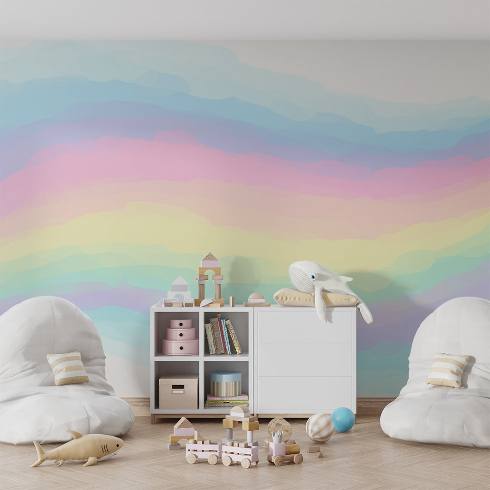 Kids-Mundo rainbow wave wall mural bringing soft colour into a playful playroom.