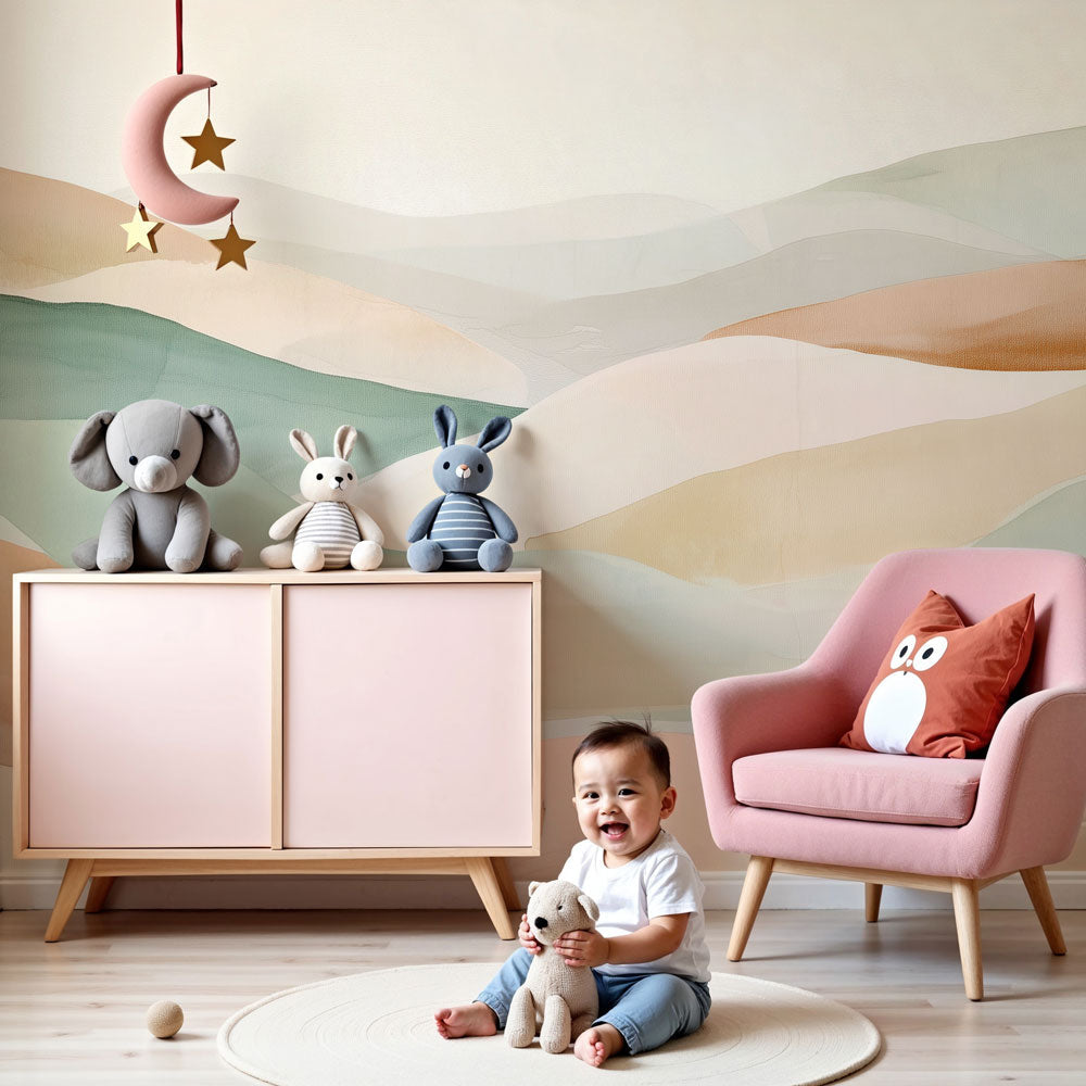Kids-Mundo pastel watercolour hills wall mural styled behind a cot in a warm, modern nursery