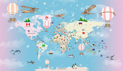 Kids-Mundo world map wall mural artwork in pink and blue pastel tones, with hot air balloons, biplanes and flags.