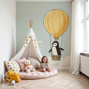 Penguin balloon mural wallpaper in modern nursery with white crib by Kids-Mundo