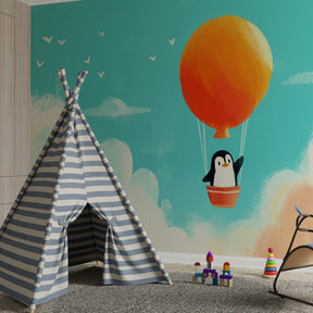 Blue sky penguin balloon wallpaper transforming children's playroom into adventure zone by Kids-Mundo