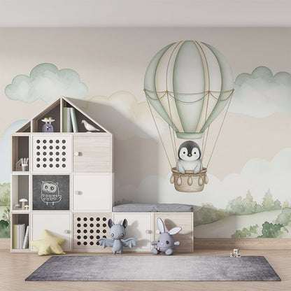 Kids-Mundo penguin balloon wall mural covering a feature wall in a cosy kids bedroom