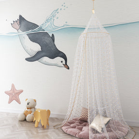 Gentle ocean penguin wallpaper transforming baby bedroom into peaceful marine sanctuary