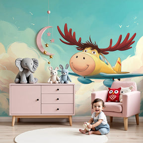 Pilot moose mural wallpaper creating aviation-themed nursery decor with yellow airplane and clouds by Kids-Mundo