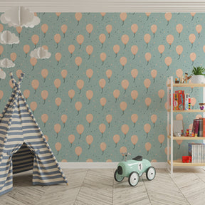 Pink balloon themed wallpaper transforming kids playroom into celebration space
