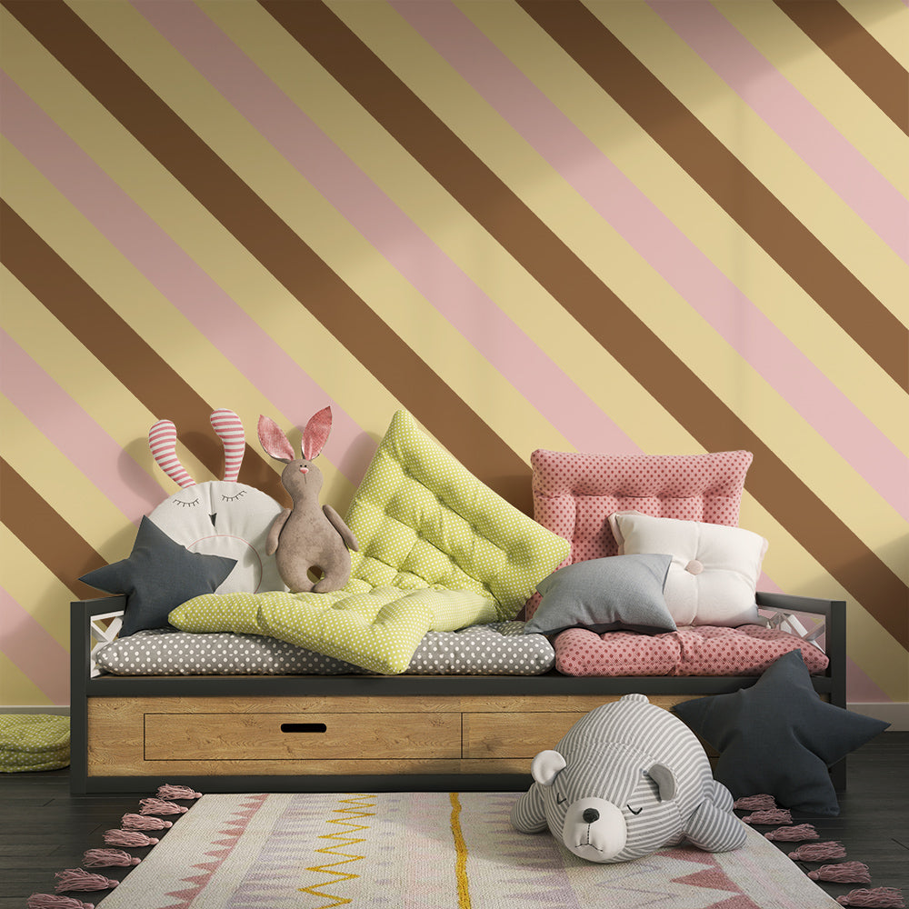 Kids-Mundo diagonal stripe wall mural in pink, beige and brown shown in a bright playroom