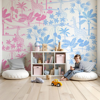 Kids-Mundo pink and blue giraffe wall mural fitted in a soft nursery with a wooden cot