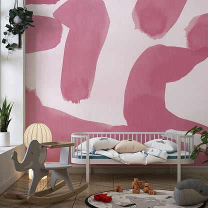 Kids-Mundo abstract pink wallpaper mural styled in a bright playroom with cushions