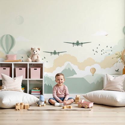 Kids-Mundo airplane and hot air balloon wall mural over mountains in a cosy nursery