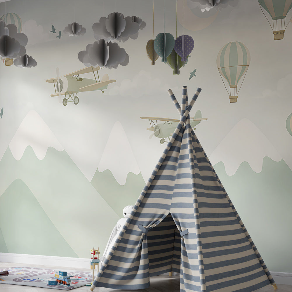 Kids-Mundo biplane and balloon wall mural displayed in a bright adventure playroom