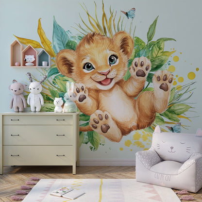 Lion cub wall mural by Kids-Mundo made to measure and hung above a bed in a cheerful kids bedroom.