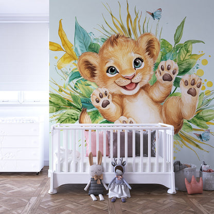 Kids-Mundo lion cub wall mural bringing jungle colour and butterflies to a bright children's playroom.