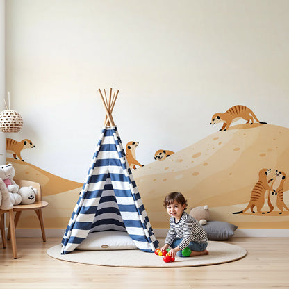 Kids-Mundo playful meerkat wall mural styled in a warm orange-toned nursery beside a cot