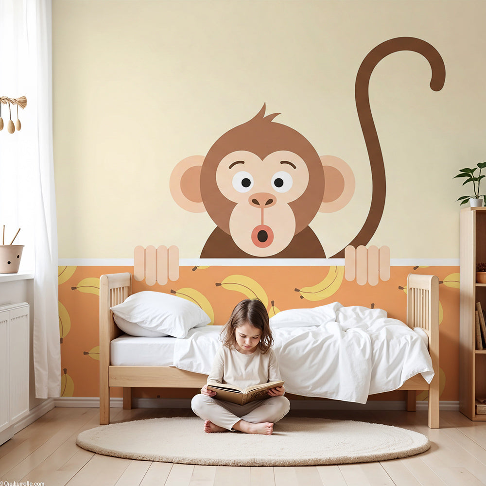 Kids-Mundo playful monkey wall mural with banana print in a warm, welcoming baby nursery.