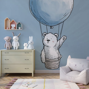 Whimsical polar bear balloon wallpaper creating dreamy atmosphere in kids bedroom