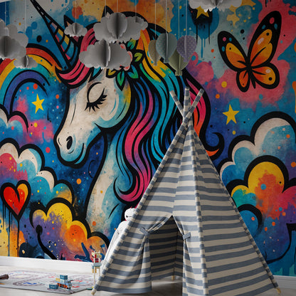 Kids-Mundo bold unicorn and rainbow wall mural behind a bed in a vibrant kids bedroom