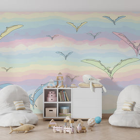 Flying dinosaur mural wallpaper creating educational and calming atmosphere in kids playroom space